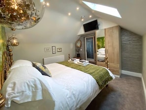 3 slaapkamers, een strijkplank/strijkijzer, beddengoed