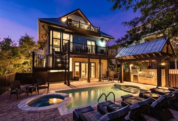 A two-story house with a swimming pool, outdoor seating, and a barbecue area. - Private Pool-4 bikes-Private Beach Access (Santa Rosa Beach)