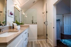Bathtub, hair dryer, towels, soap