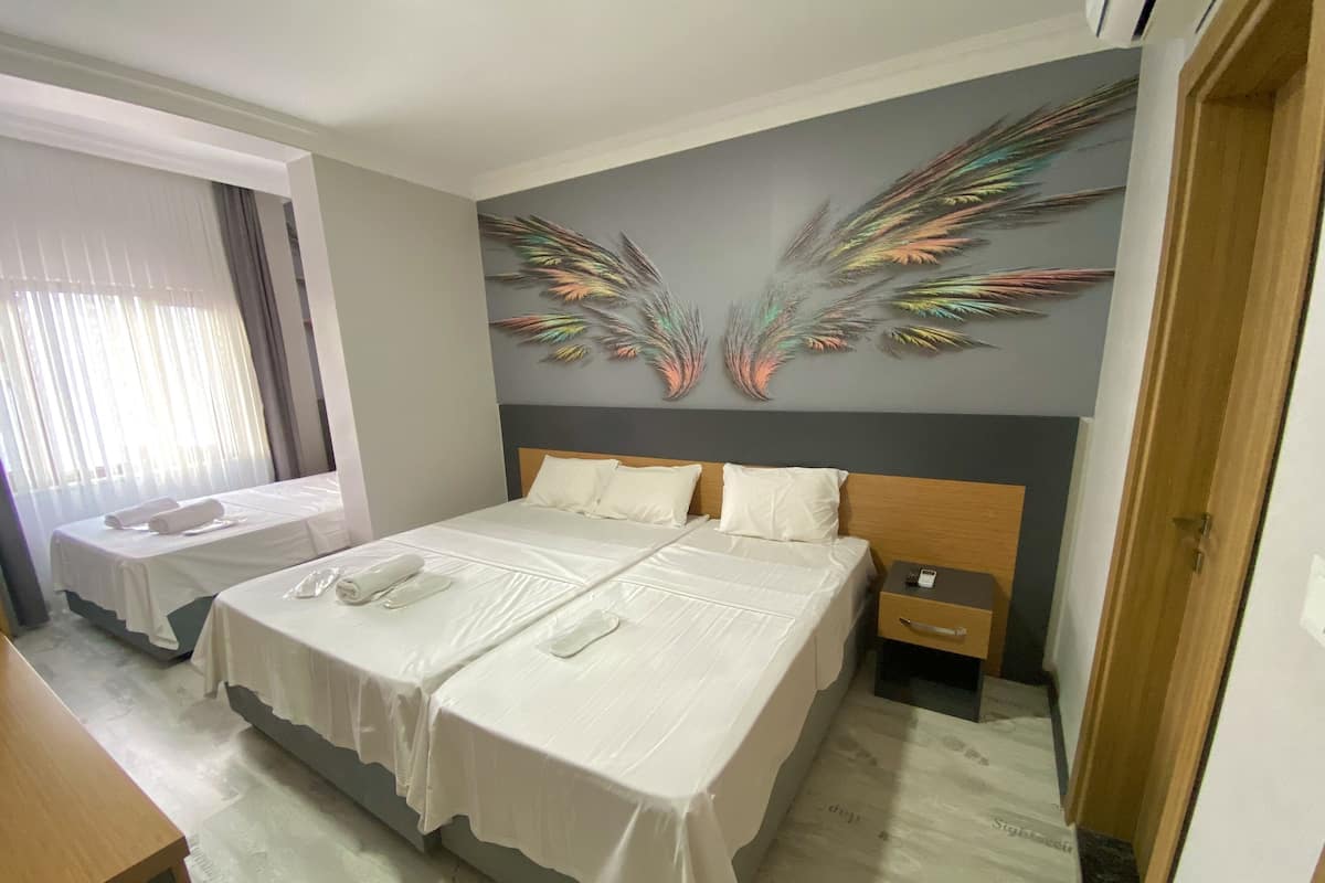 (D) Deluxe Family Room | Minibar, desk, soundproofing, iron/ironing board