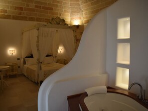 Signature Suite | Premium bedding, in-room safe, desk, soundproofing