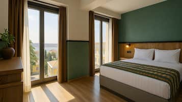 Quarto casal superior, vista para o mar | Roupas de cama premium, frigobar, cofres nos quartos