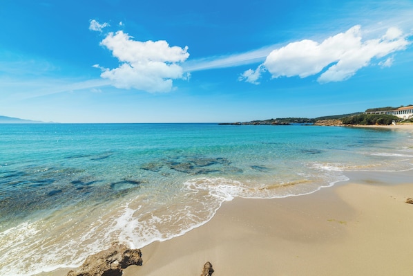 Beach nearby, sun loungers