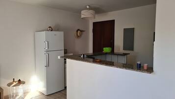 Microwave, coffee/tea maker, cookware/dishes/utensils