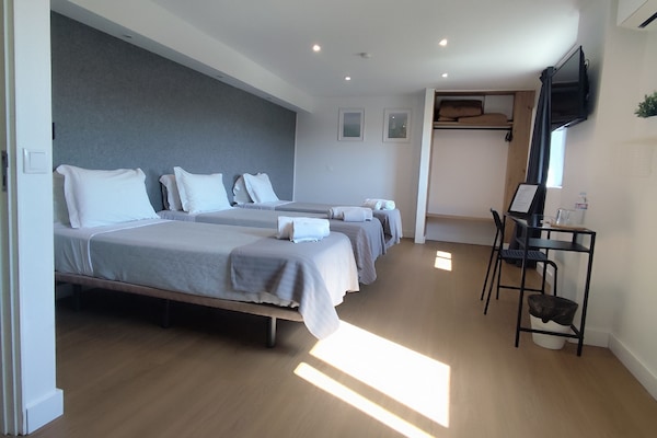 Classic Triple Room, City View | Hypo-allergenic bedding, free WiFi