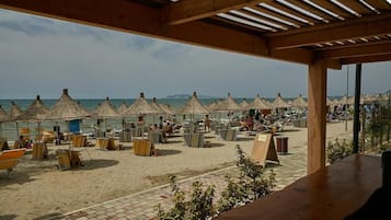 Private beach, beach cabanas, sun loungers, beach umbrellas
