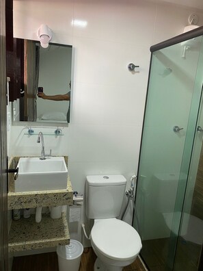 Shower, towels, soap, toilet paper