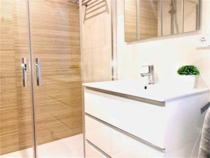 Hair dryer, towels, soap, toilet paper