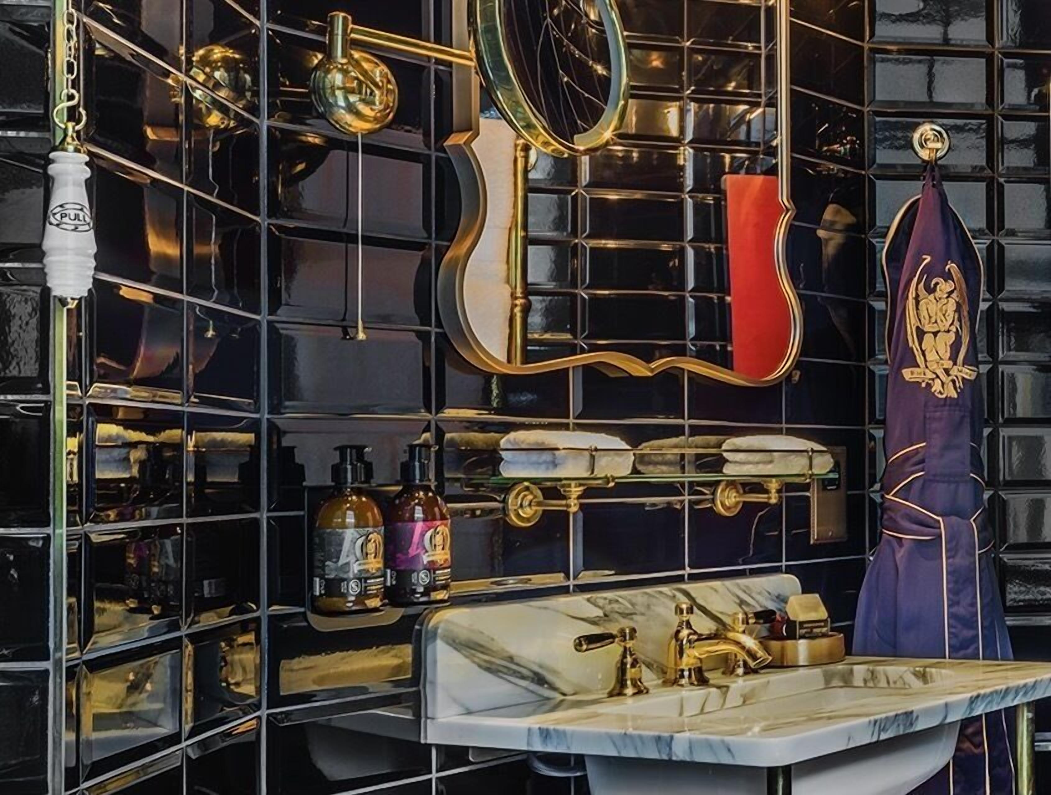 designer toiletries, hair dryer, bathrobes, towels