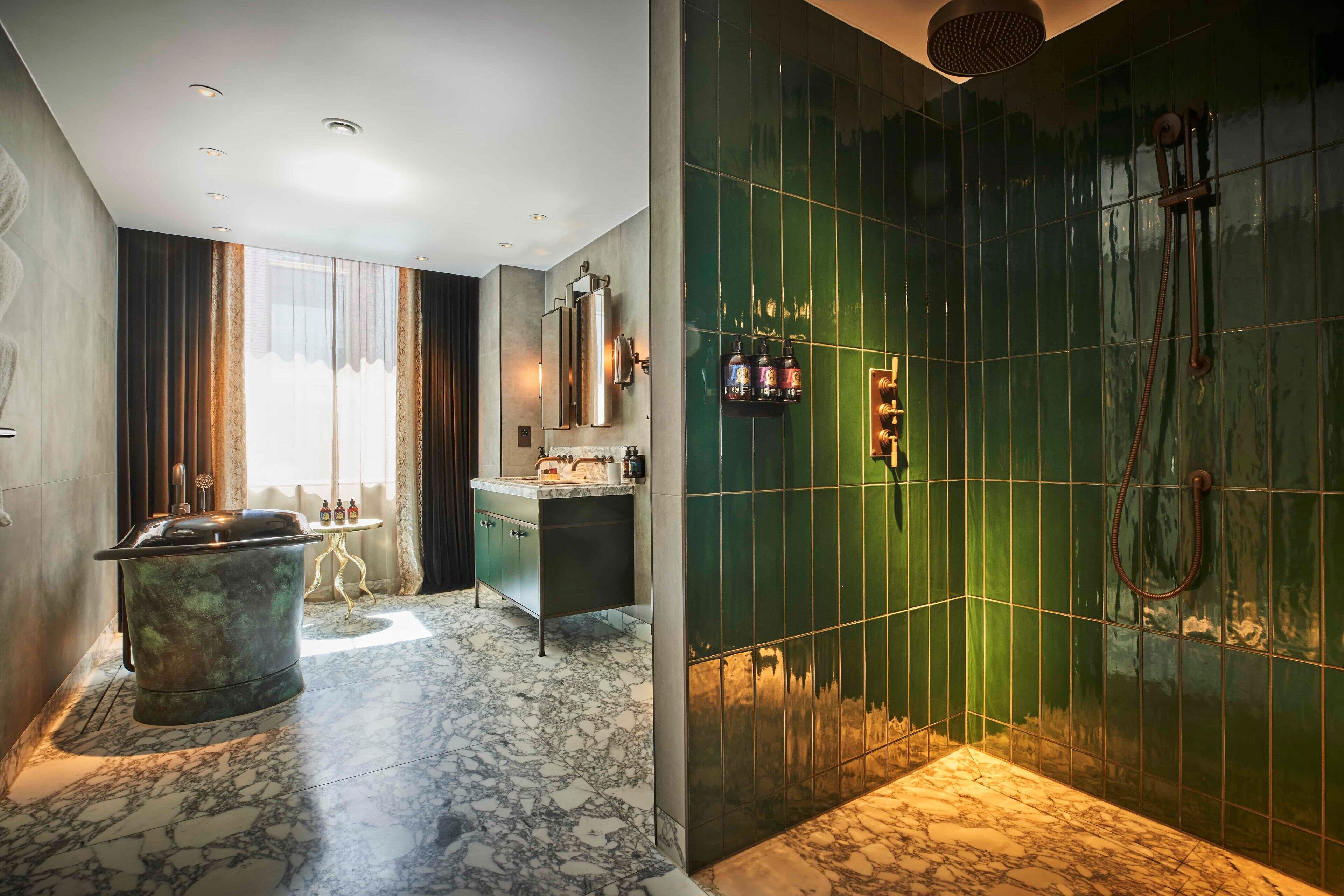 york apartment | bathroom | designer toiletries, hair dryer, bathrobes, towels