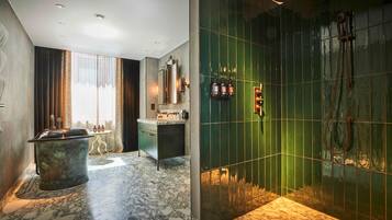 York Apartment | Bathroom | Designer toiletries, hair dryer, bathrobes, towels