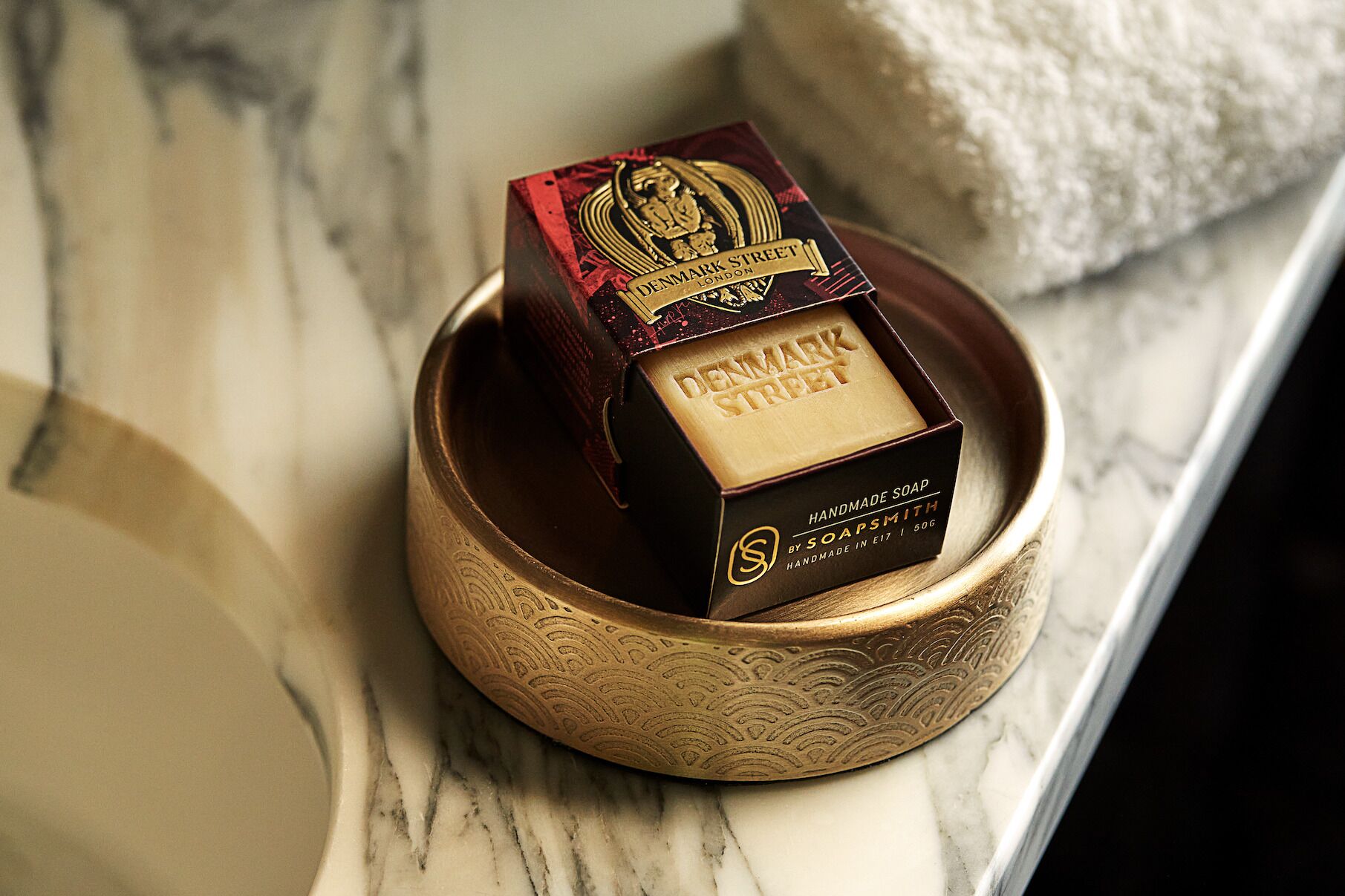 designer toiletries, hair dryer, bathrobes, towels