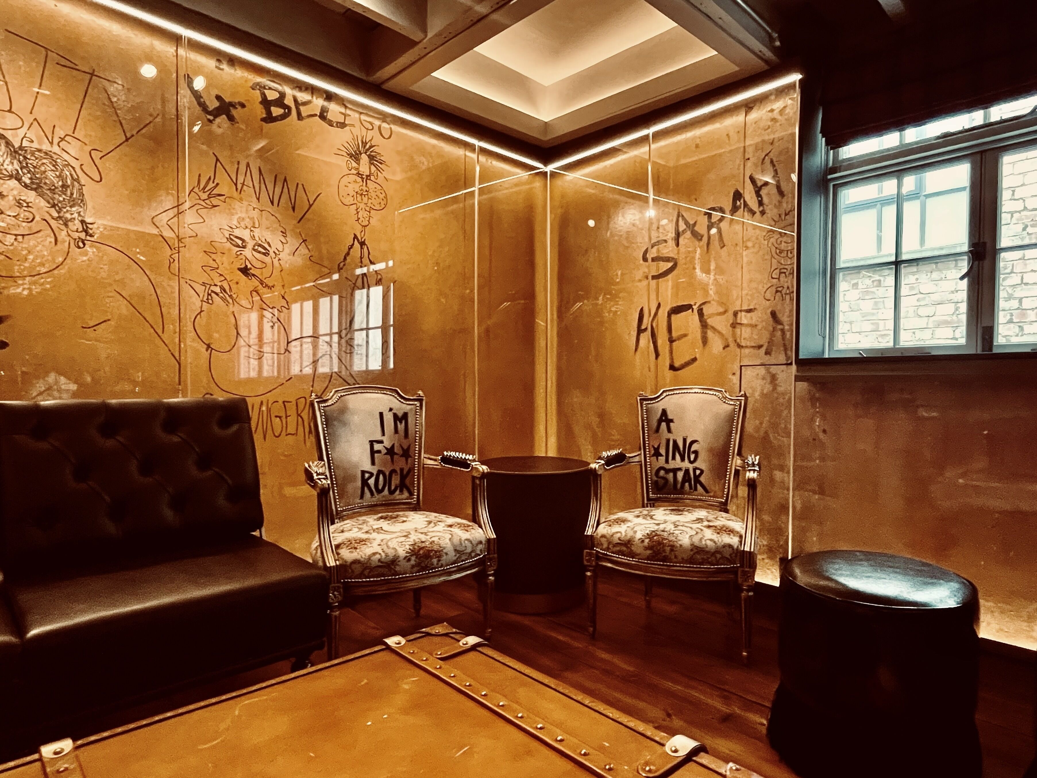 signature apartment | living area | 65-inch plasma tv with digital channels, tv, heated floors