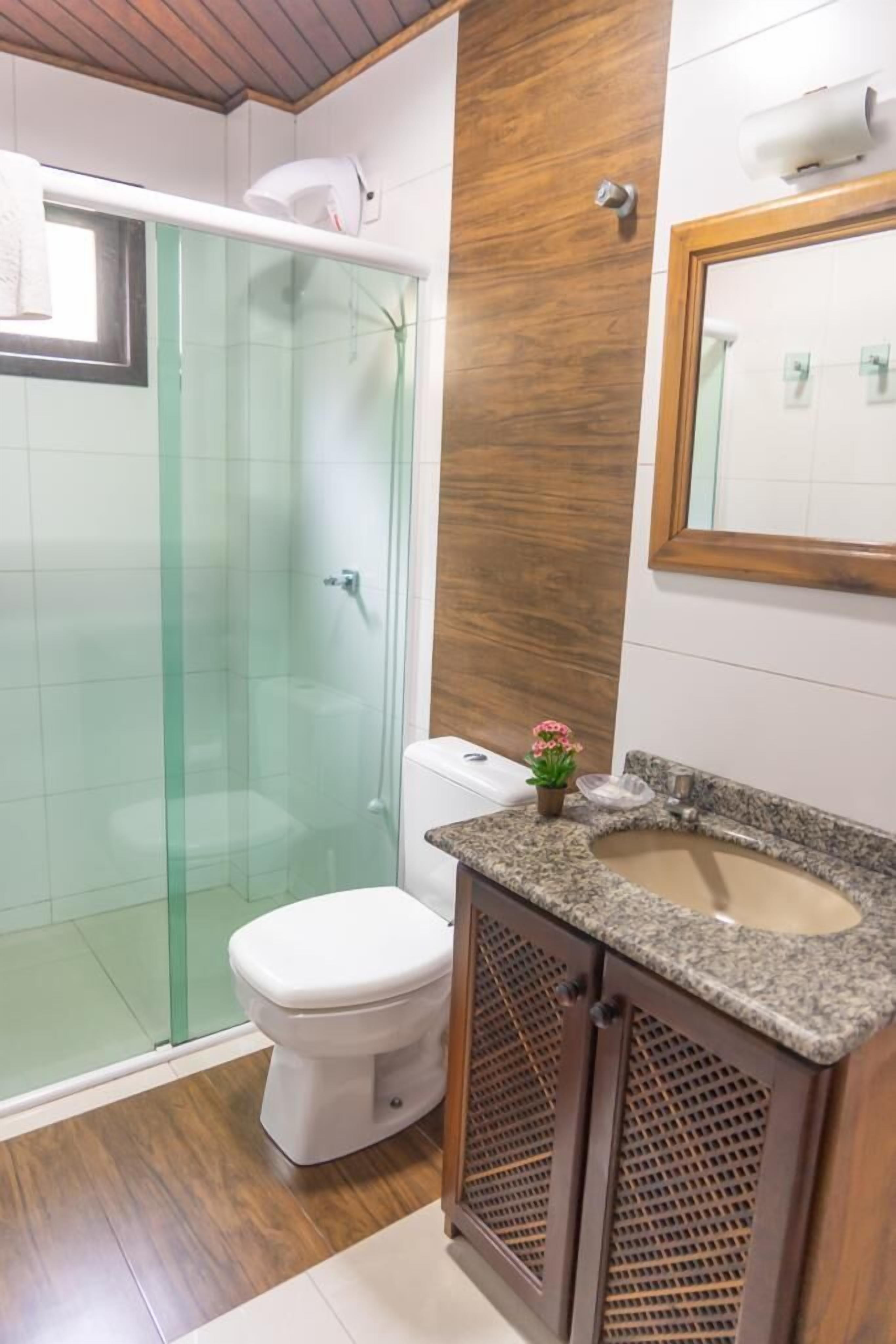 economy room | bathroom | shower, hair dryer, towels, soap