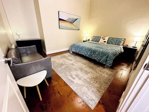 1 bedroom, desk, iron/ironing board, travel crib