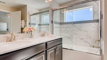 Bathtub, hair dryer, towels