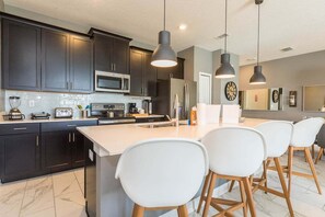 Fridge, microwave, oven, stovetop - 8924 SD - Luxury 4BR Townhome: Private Pool (Four Corners)