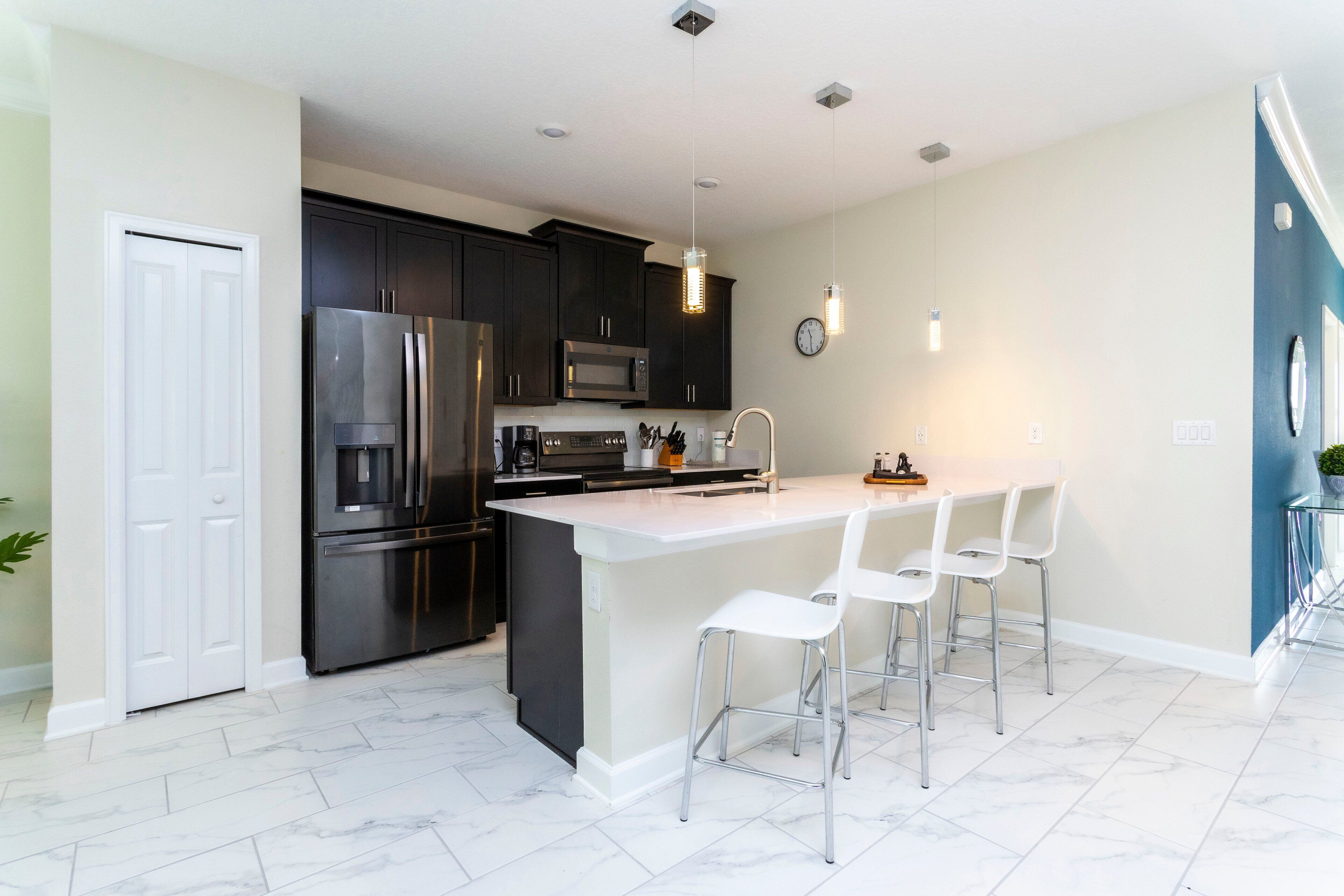 Coffee/tea maker, fridge, microwave, oven