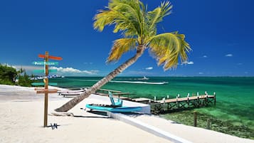 On the beach, sun loungers, beach towels