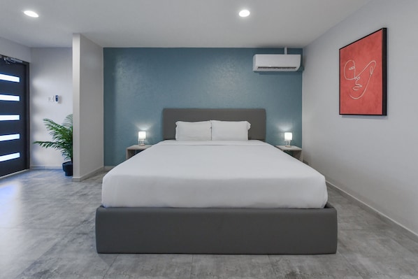 1 chambre, coffre-fort, fer et planche à repasser
