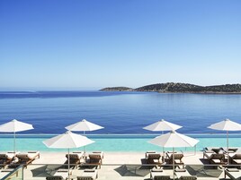 Outdoor pool, open 10:00 AM to 6:00 PM, cabanas (surcharge)