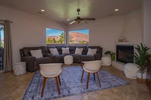 Smart TV, fireplace, books, video library