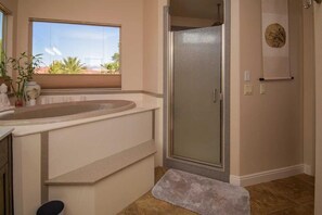 Combined shower/tub, hair dryer, towels, soap