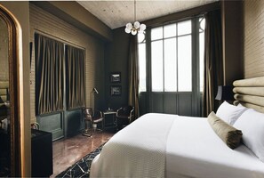 Olmsted Suite | Premium bedding, free minibar items, laptop workspace, blackout drapes - The Bellwether Hotel (Louisville)