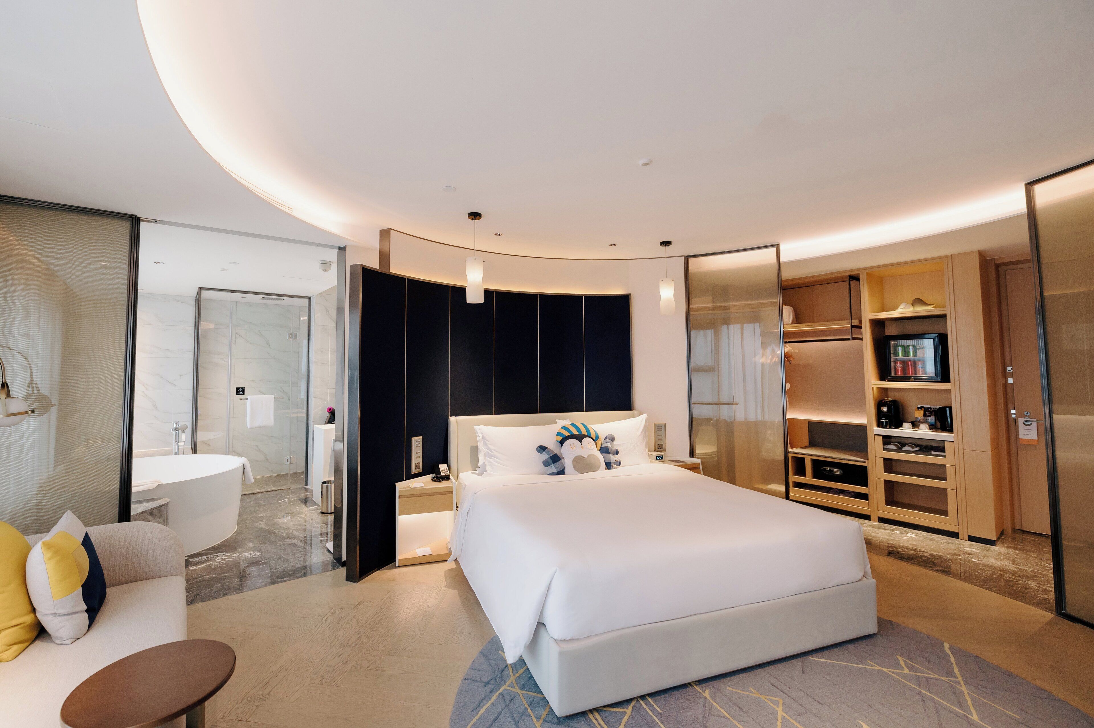 Suite, 1 très grand lit | Minibar, coffres-forts dans les chambres, rideaux occultants