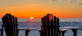 Beautiful Log Home on 5 acres private beach-steps down the road!