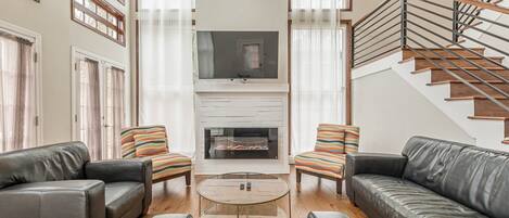 Smart TV, fireplace, books