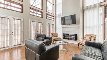 Smart TV, fireplace, books