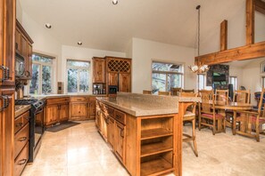 Fridge, microwave, oven, stovetop - Sunriver Adventure Lodge - 4BR/3.5BA, 2 Primary suites, A/C, Bikes, & SHARC (Sunriver)