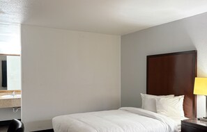 Desk, laptop workspace, free WiFi, bed sheets