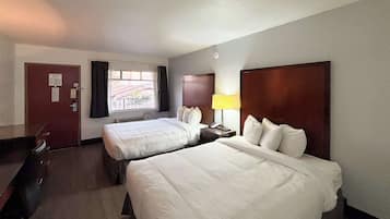 Desk, laptop workspace, free WiFi, bed sheets