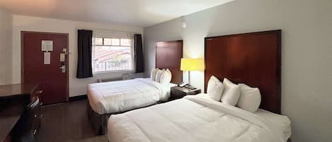 Desk, laptop workspace, free WiFi, bed sheets