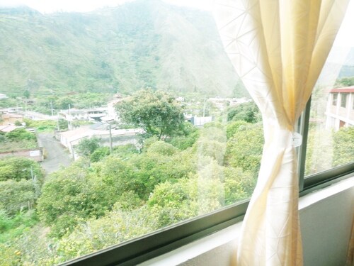 Casa Vacacional Baños white blue house