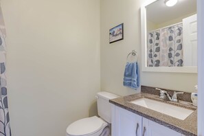 Combined shower/bathtub, hair dryer, towels, soap