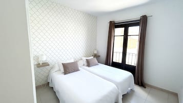 2 slaapkamers, een strijkplank/strijkijzer, reisbedje, gratis wifi