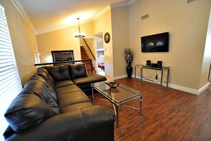 Smart TV, chimenea, reproductor de DVD y tenis de mesa 