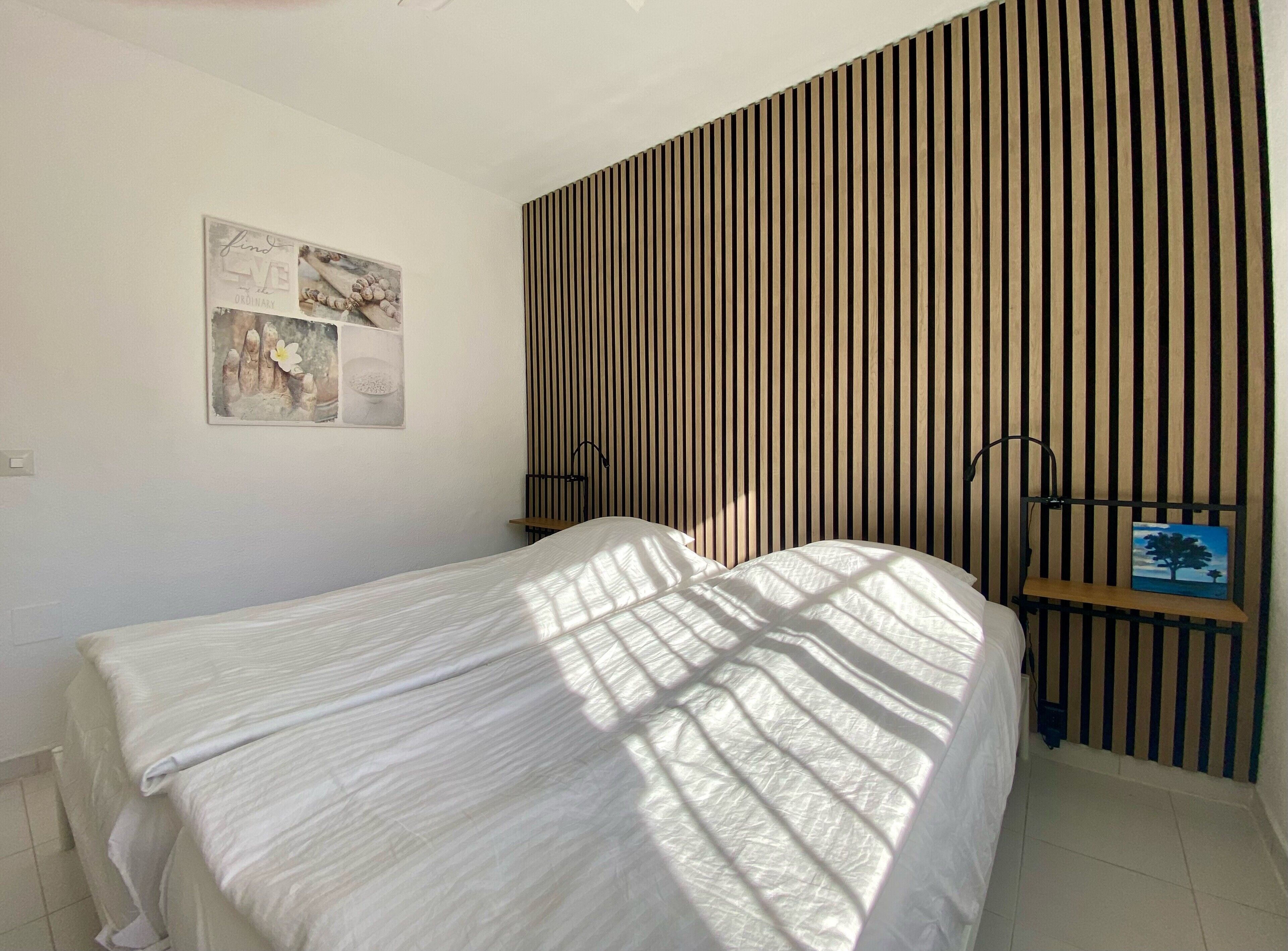 2 slaapkamers, een strijkplank/strijkijzer, gratis wifi, beddengoed