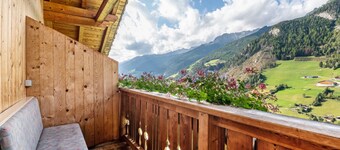 Appartamento "Glocklechnhof Sonnenschein" con vista sulle montagne, giardino, balcone e Wi-Fi