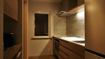 House, 2 Bedrooms | Private kitchen | Full-sized fridge, microwave, stovetop, electric kettle