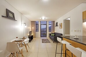 Apartment (1 Bedroom) | Living area | TV