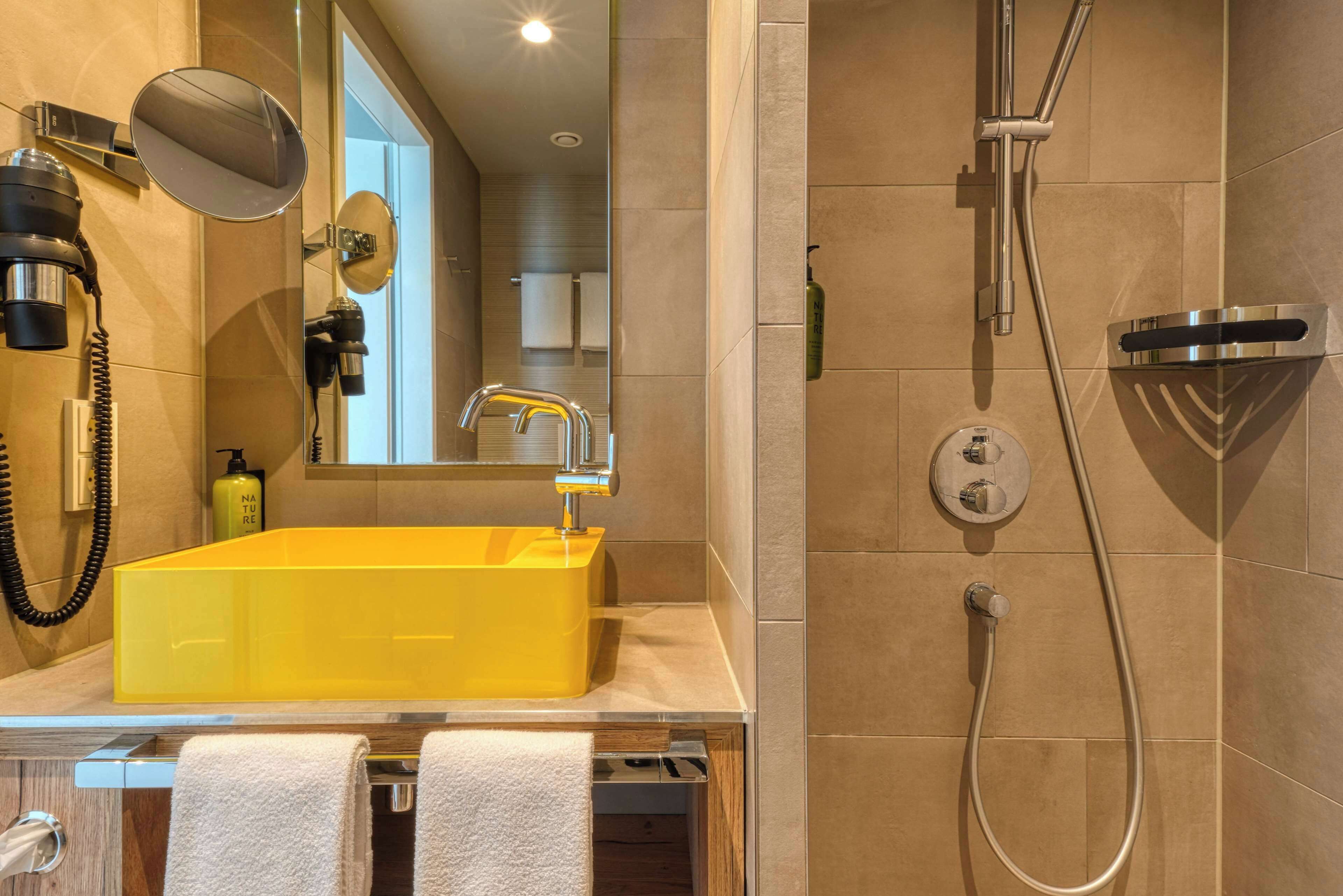 comfort room (double) | bathroom | shower, hair dryer, towels