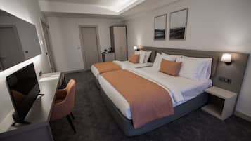 Ropa de cama de alta calidad, minibar y escritorio