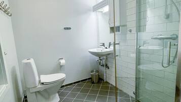 Shower, heated floors, towels, soap