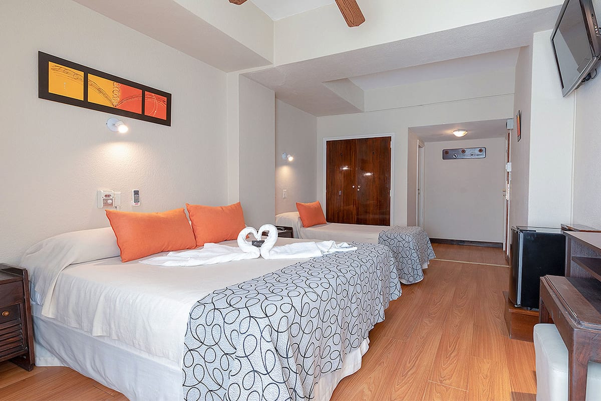 Superior Triple Room | Desk, laptop workspace, blackout drapes, WiFi (free)
