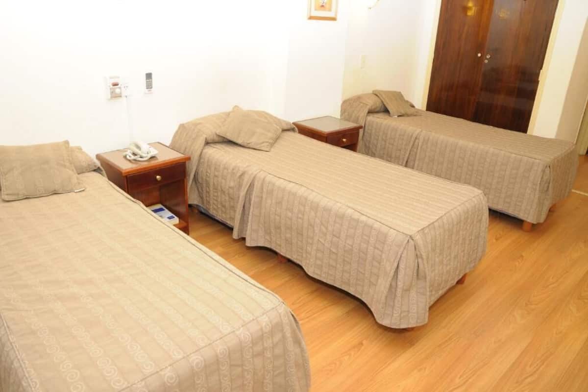 Standard Triple Room | Desk, laptop workspace, blackout drapes, WiFi (free)