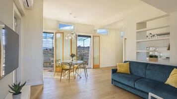 Basic Apartment, Multiple Beds | Living room | TV, streaming services